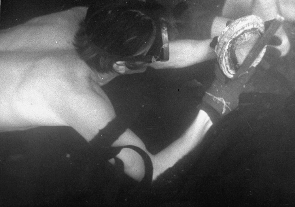 A member of a lifeguard’s party dove for abalone that would be part of their end-of-summer seafood feast, California, 1940.